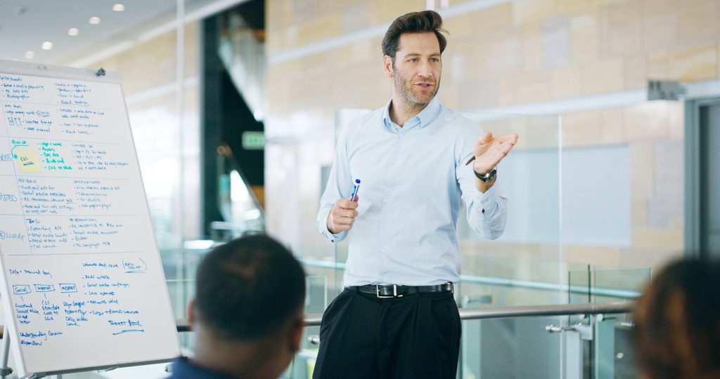 Businessman, proposal and whiteboard for training, discussion and erp notes with presentation or re