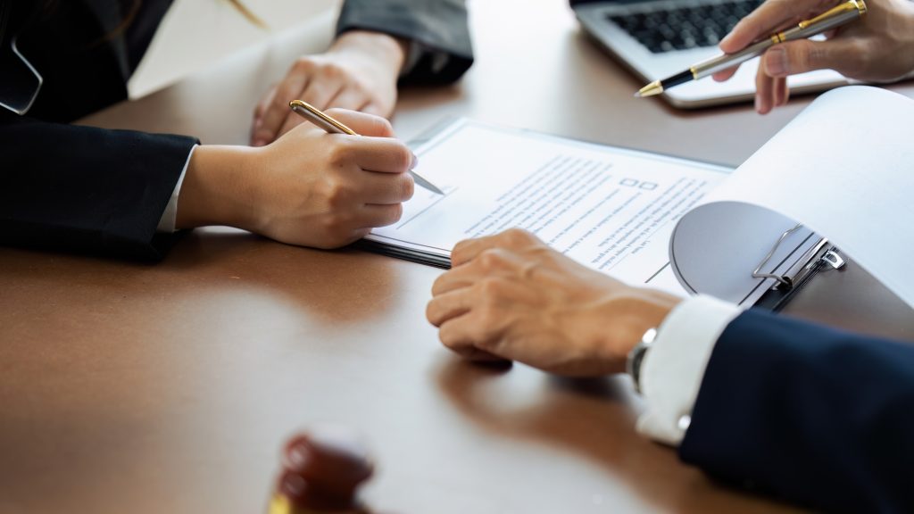 lawyer or business advice service concept with hammer of justice beside